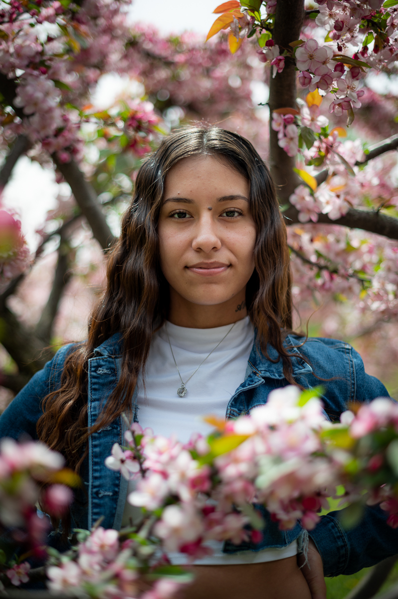 ST. PAUL, MN - May 19, 2022: Maria Tovar, 20 of Minneapolis, MN, poses for a portrait at a park in Minneapolis, MN.