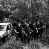 June 16, 2015. A team of Hungarian police officers stand to attention in a forest close to the country's border with Serbia, Morahalom, Hungary. 