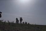 Migrants and refugees walk towards Serbia's border with Croatia, Sid, Serbia, Sept. 18, 2015. 