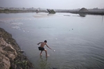 A child jumps into the Tigris, Baghdad, Iraq, 2008.