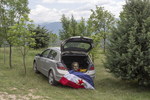 A bust depicting Josip Broz Tito, former Yugoslav leader, along with the Yugoslav flag, sits inside a boot of a car, Kocani, Macedonia, May 25, 2019. The items were used in a privately organized celebration of Tito's birthday in Kocani, eastern Macedonia. 