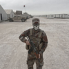 Loay Mahdi, an army soldier from Kirkuk, Iraq, stands guard at the Qayara West Coalition base in Qayara, south of Mosul, Iraq, Oct. 28, 2016. 