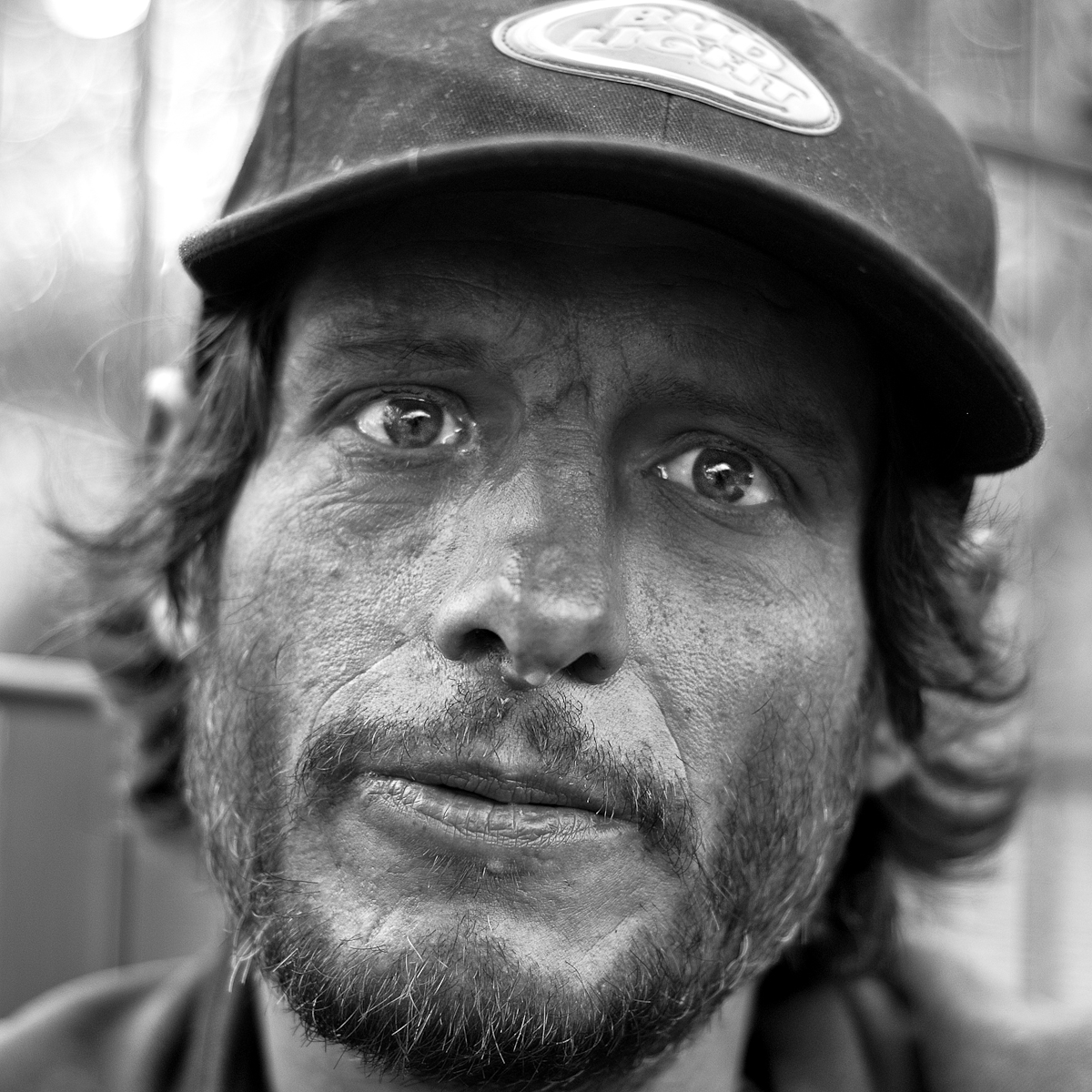 HOMELESS MAN WHOSE LIFE DETOURED WITH A CRASH THAT NEARLY KILLED HIM, SAN FRANCISCO, JUNE 2006homeless john is from the bay area. john studied to be a mechanic of some sort at a trade school in arizona in the 80s. on january 13, 1987 at 8:46pm, he hit a horse in the middle of the road going 55. there were no survivors. but the paramedics brought him back.his fingers and palms are twisted in a manner cruel to someone who sought to earn a living with his hands. his face bones are largely broken. his tear ducts discharge through his right eye what should come out his nose.he got by though and managed to live in a small studio (with city assistance) and do small jobs through st. vincents. on one job, he was seeking to break up a fight when one of the guys pulled a knife and lunged to stab him. he was wearing several coats and suffered only cuts to his clothing. but he was enraged and severely beat the man; sending him to the hospital. st. vincents dropped him.in 2004, a neighbor accused him of trying to stab him. he lost his housing.now he “camps out” and does small jobs after hours for some local nightclubs.(6/19/06)