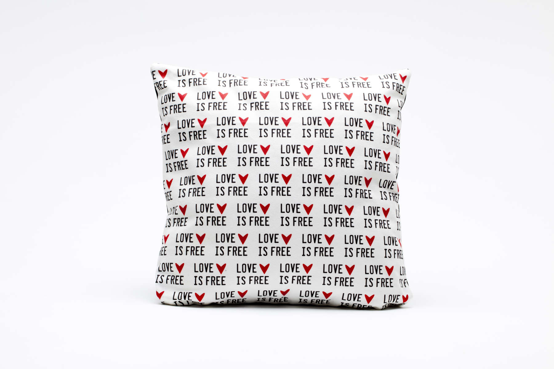 pURCHASE hERElove is free, so why not be generous with yours?this pillow is sure to not only spruce up your space, but also to remind you that love is free for the giving.  printed on heavy cotton twill, this custom doodlegirl designs fabric is both fun and durable // back side is solid black.designed + hand-sewn in boulder, colorado.limited quantities available in three sizes:12x12 12x1614x14