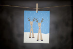 pURCHASE hEREneed a little winter cheer to spruce up your space?  these sweet pair of reindeer are sure to do the trick!  this is an 8x10 doodlegirl designs original.  it comes wrapped in a cellophane sleeve with cardboard backing.although this print can certainly stand alone, he does look super cute nestled in between his buddies:  snowman (check out here + snowcapped trees (check out here). crafted + printed in colorado, usa.