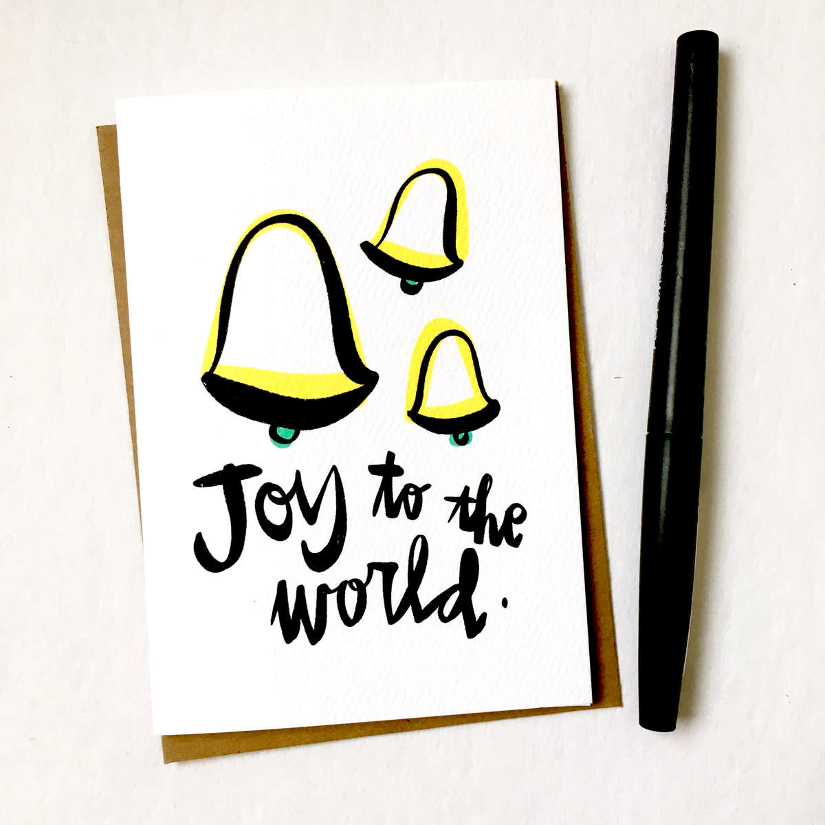 purchase hereou can almost hear those bells, right?! // this brand new holiday card is perfect for spreading a little joy to the world // snag yours now while they're still in stock!each card is:printed on 100# recycled + responsibly-sourced paper //measuring 3.5{quote} x 5{quote} //accompanied by a recycled kraft paper 4-bar envelope //professionally printed on a digital press //individually packaged in sealed cellophane sleeve //made with mad love in colorado, usa. 