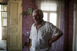 2017. Georgia, Otari stands in his home in Khurvaleti village, near the southern border of South Ossetia.(Otar passed away in 2019).