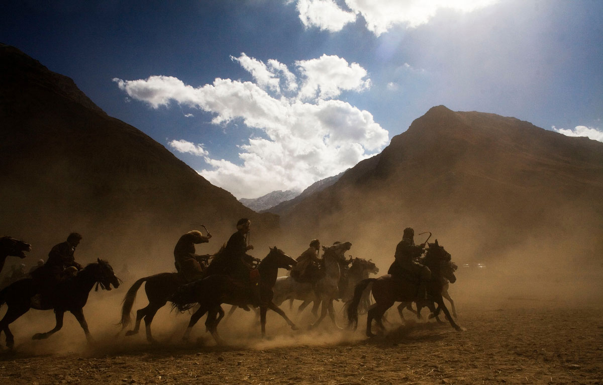 The men of Khenj, Afghanistan, compete in a game of buzkashi. 