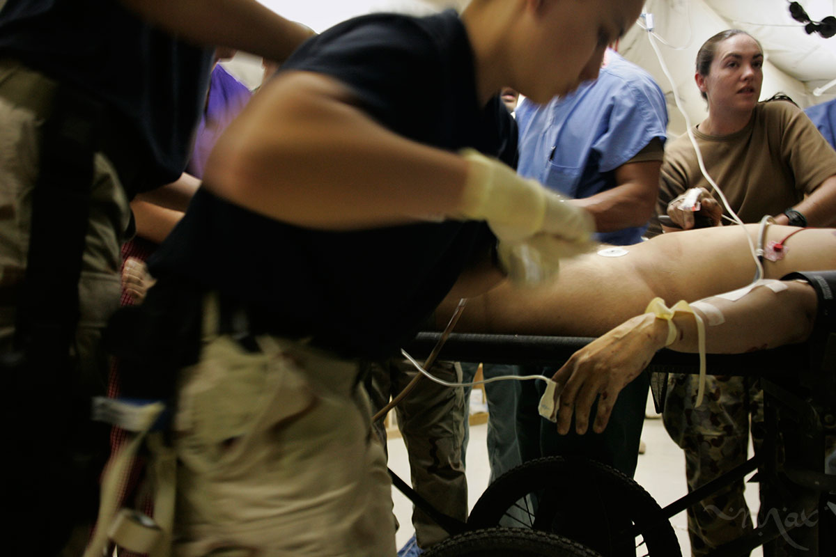 The medical staff at the Air Force Theater Hospital run by the 332nd Expeditionary Medical Group at Balad Air Base treats wounded American soldiers. 