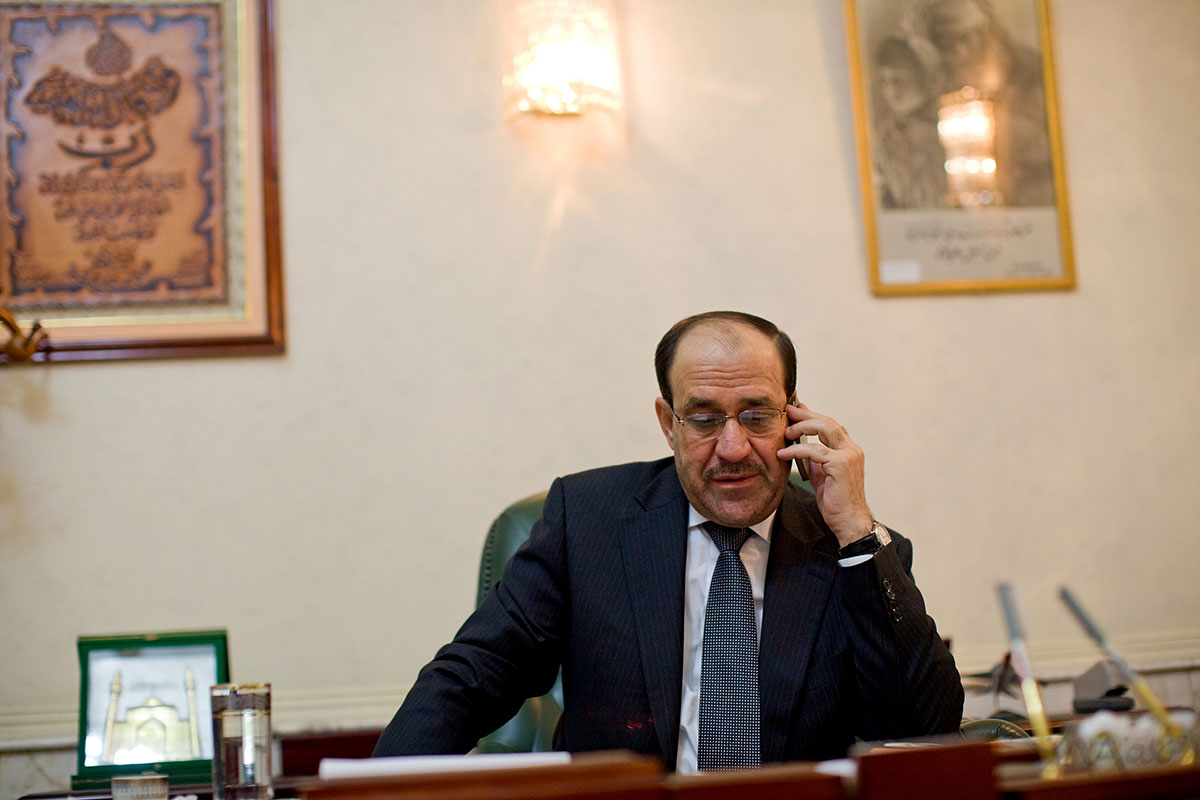 Iraq Prime Minister Nouri al-Maliki works in his office in the International Zone in the center of Baghdad, Iraq on Sunday December 26, 2010. Al-Maliki collected the coalition he needed to form a new government on December 21, 2010, which allowed him to start his second term even though his political bloc lost to Iyad Allawi’s rival bloc in the March 7th parliamentary elections.