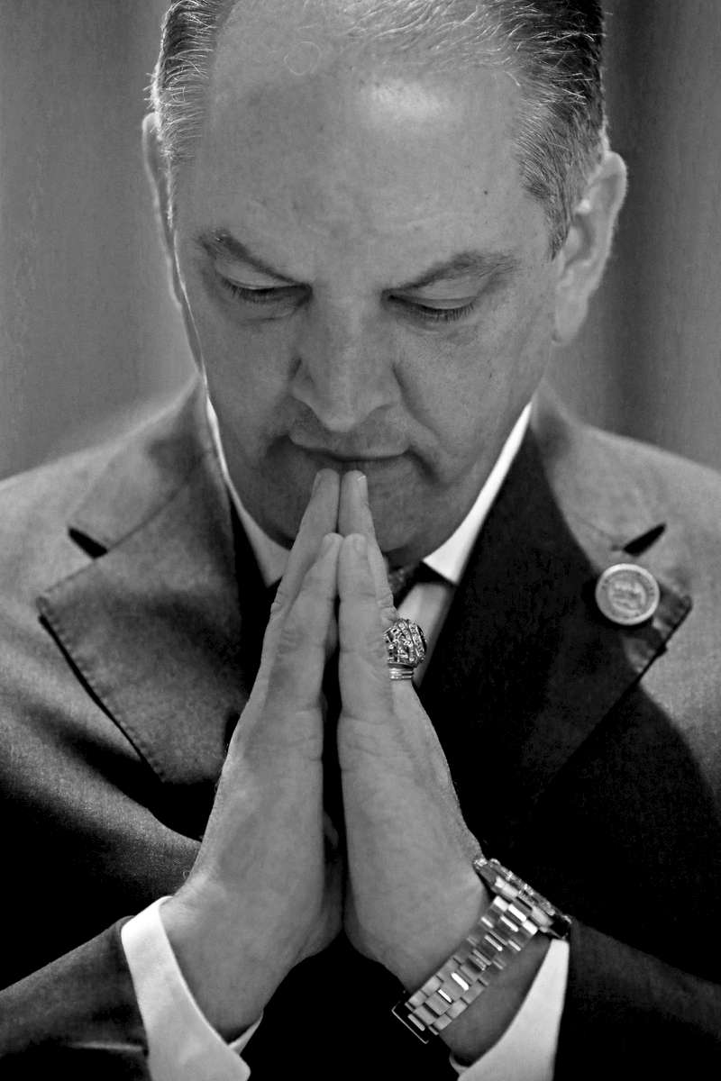 BATON ROUGE, LOUISIANA. Louisiana Governor John Bel Edwards prays in the House Chambers before addressing a Joint Legislative Session in Baton Rouge, La., Monday, March 14, 2016. Today marks the opening of the regular Louisiana legislative session after a special three-week session on budget issues concluded last week.(AP Photo/Max Becherer)
