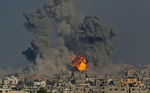 GAZA CITY, GAZA STRIP. Explosions caused by Israeli airstrikes erupt in the Jabal al-Rayyes neighborhood of Gaza City in the Gaza Strip on July 29, 2014. Israel said they were targeting 32 tunnels dug to allow Hamas militants to go under the border fence and infiltrate Israel.