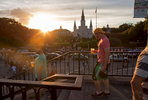 NEW ORLEANS, LOUISIANA. Beer holding visitors enjoy the setting sun on Jackson Square at the heart of the French Quarter in New Orleans, Saturday, Aug. 15, 2015. Katrina seemed like the final blow to a city long in decline, suffering from urban crime, white flight, the vagaries of the energy market and gross mismanagement. Roughly 80 percent of the city was under water. Hundreds of people drowned inside their homes, their bodies floating in the muck. Hospitals and police were overwhelmed. The city emptied.Now, as people describe the city’s resurgence, they reach for metaphors that verge on the Biblical: a resurrection, an economic and cultural renaissance, a rebirth. (AP Photo/Max Becherer) 