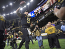 New Orleans Saints quarterback Drew Brees (9) leaves the dome after the game as he celebrates breaking the NFL record for career passing touchdowns of 539, set by Peyton Manning, in the second half of an NFL football game against the Indianapolis Colts in New Orleans, Monday, Dec. 16, 2019. 