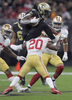 New Orleans Saints running back Alvin Kamara (41) jumps over San Francisco 49ers free safety Jimmie Ward (20) during the first half of an NFL football game in New Orleans, Sunday, Dec. 8, 2019. The San Francisco 49ers won 48-46.