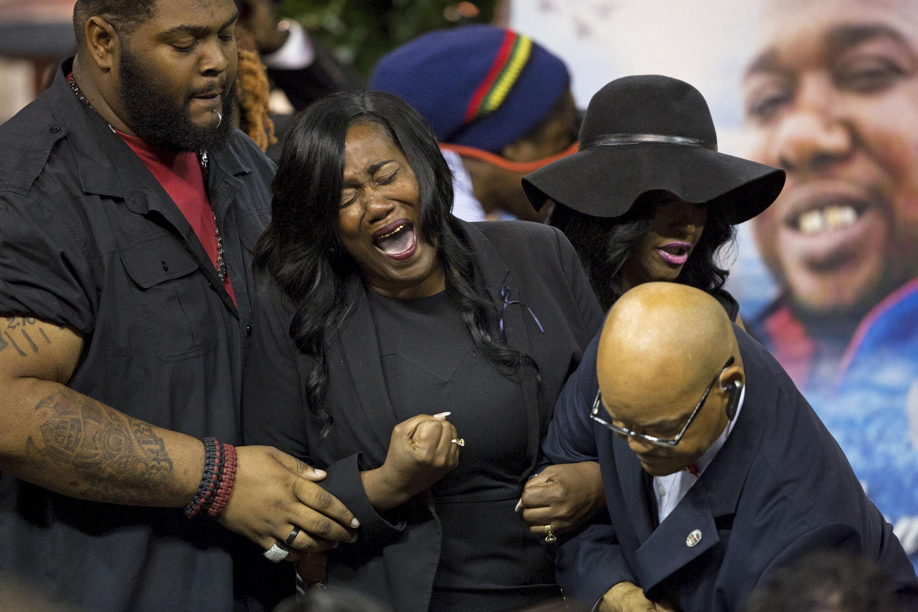 Sandra Sterling, the aunt of Alton Sterling, a black CD seller captured on video being shot and killed by a white police officer on July 5th, cries out after viewing his body at the F.G. Clark Activity Center in Baton Rouge, La. USA, Friday, July 15, 2016. Rev. Al Sharpton, who spoke at the roughly three hour service, called for more accountability for police officers who kill African-Americans and reeled off a list of high-profile police shootings that have angered many in the black community: {quote}We have an inferior judicial system that does not protect all of its citizens equally.{quote} (AP Photo/Max Becherer)