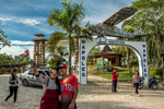 August 19, 2017. Puerto Triunfo, Antioquia, Colombia. Visitors take pictures at the old entrance of the Hacienda Napoles. The airplane on top it has been said to be a replica of the Piper PA-18 airplane which transported Escobar’s first shipment of cocaine to the US. The luxurious 7.7 sq miles was build and owned by Pablo Escobar in the early 80’s. After his death in 1993, the farmed was abandoned and raided. In 2006, the Colombian Government acquired the ownership of the property. In 2014, an African theme park was built. Parque Tematico Hacienda Napoles (57.018000520344, http://www.haciendanapoles.com/contactenos)