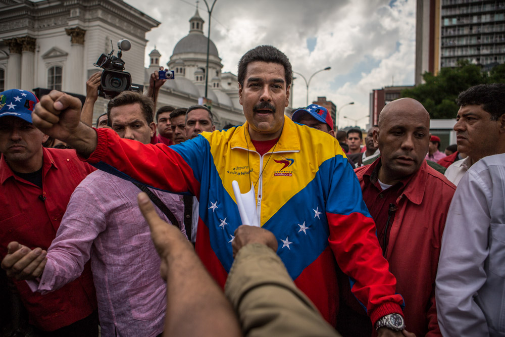 Venezuela´s interim president NicolásMaduro greeting a group of supports after announcing his candidacy for president at a rally in Caracas. March 11, 2013. 