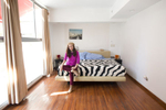 Coreographer and dancer Andrea Yugoslavia Chirinos in her bedroom in Mexico City.