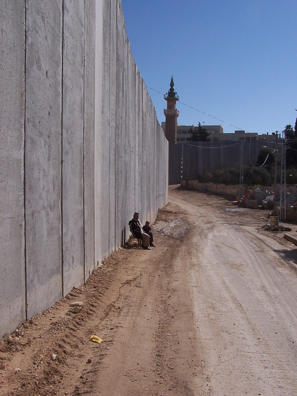 Abu Dis, a Jerusalem suburb, is separated from Jerusalem by a 26 ft concrete wall. It snakes in and out separating houses, and families.
