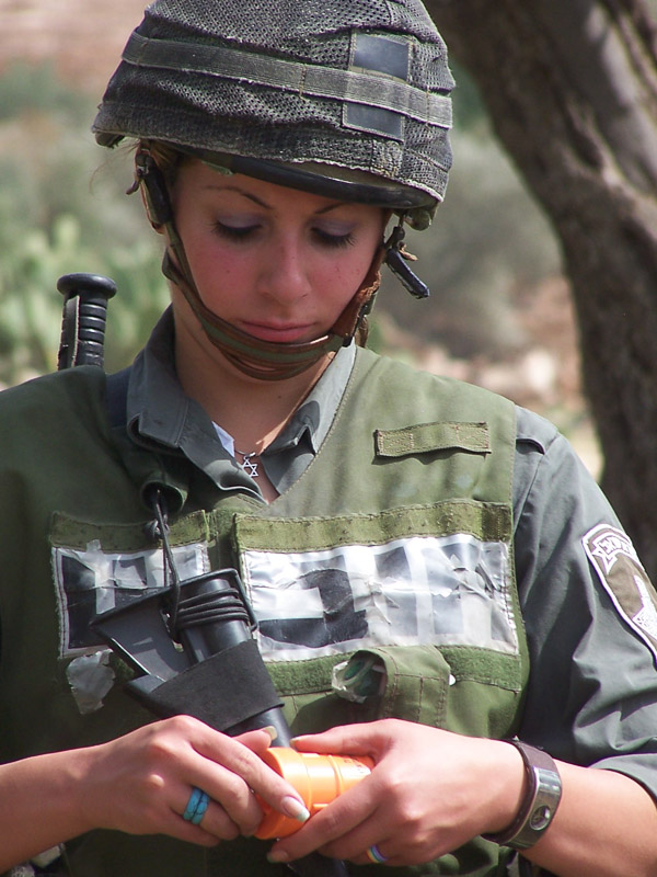 Female Israeli soldier during demonstration against the wall