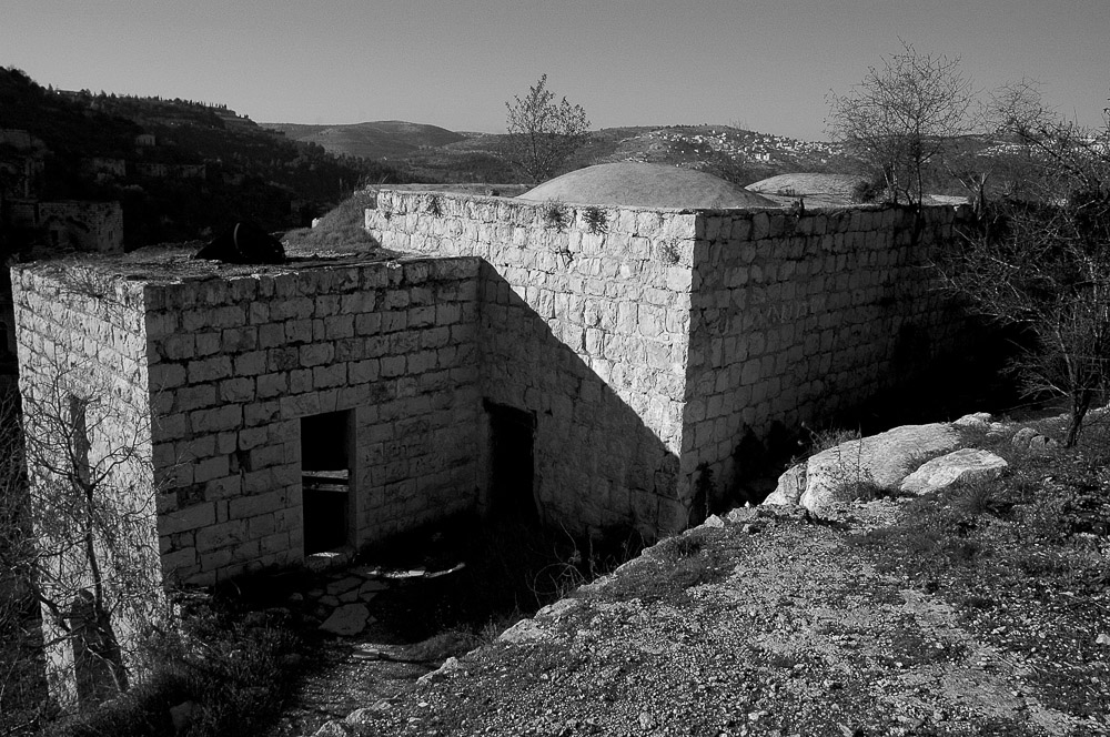 Lifta was a Palestinian village on the outskirts of Jerusalem. The population fled during the Nakba in 1948. The village is fairly intact; in 2012 plans to rebuild the village as an upscale neighborhood were rejected by the Jerusalem District Court.
