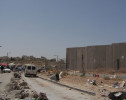 The 26ft high concrete wall at Qalandia separates Ramallah with A Ram.