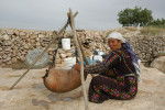 Woman in Qawawis making yogurt