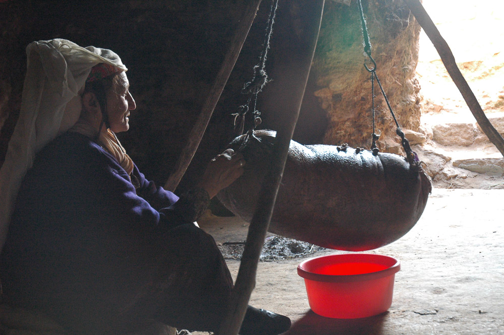 Woman in Qawawis making yogurt