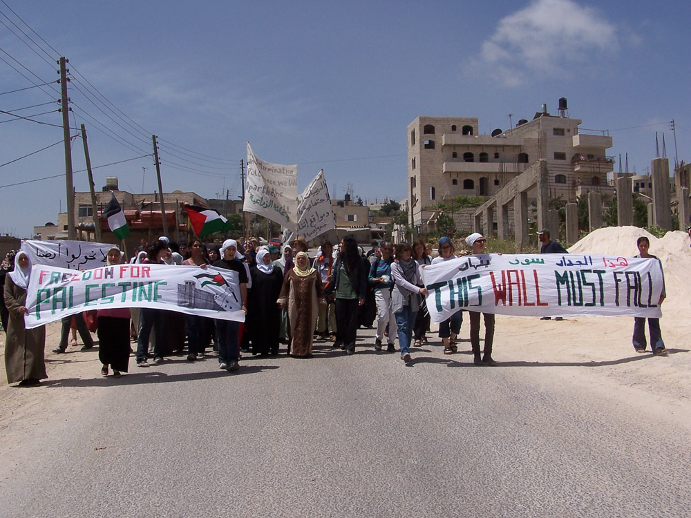 Palestinian, International, and Israeli women demonstrating against the construction of the wall.