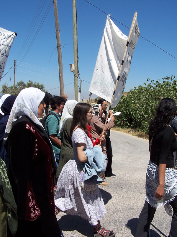 Palestinian, International, and Israeli women demonstrating against the construction of the wall.