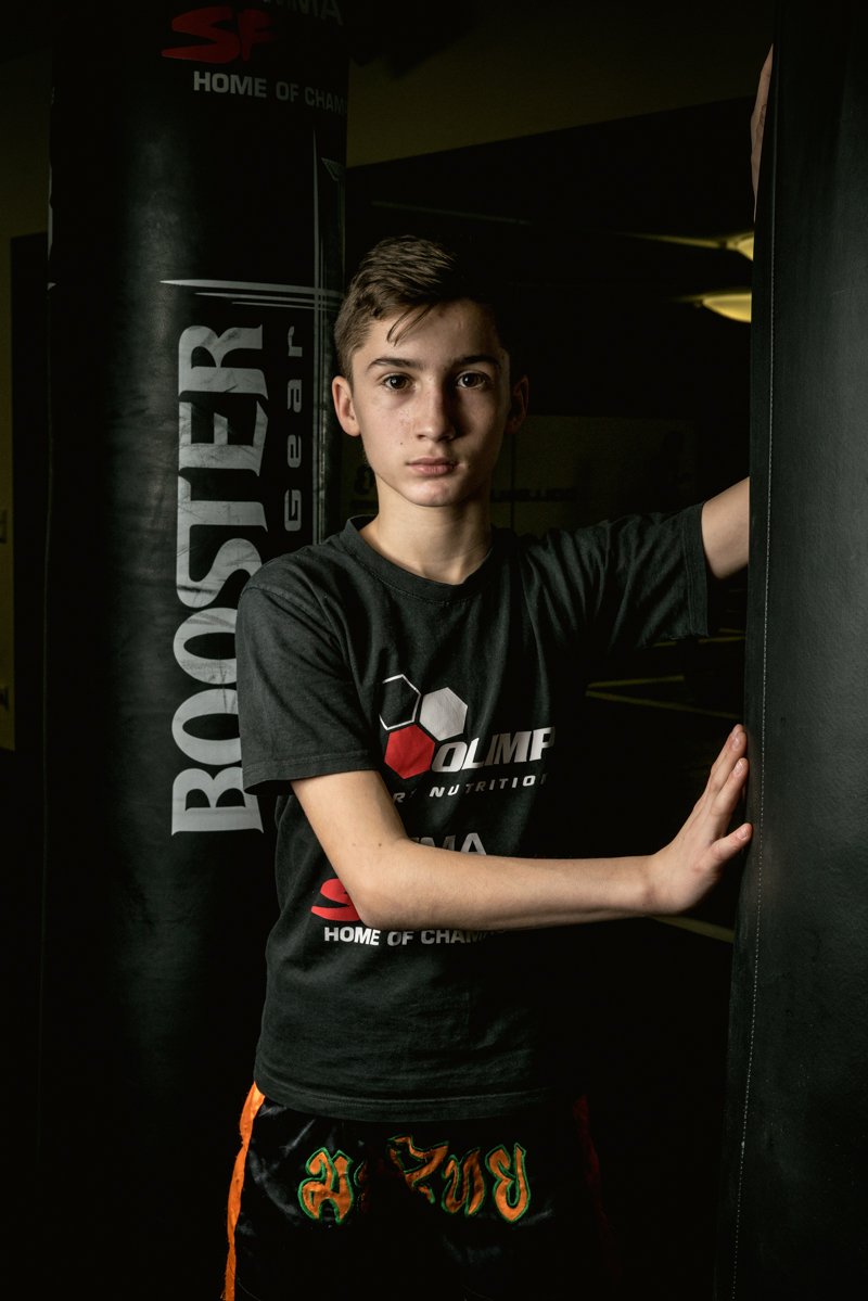 Christian Vodenski, Germany's youngest professional Mixed Martial Arts fighter, is leaning against a punching bag