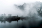Fog at the lake Popradské Pleso in the High Tatras mountains in Slovakia