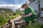 Amand Saurin, an apothecarist making rosewater in her garden in Northton, Isle of harris. 