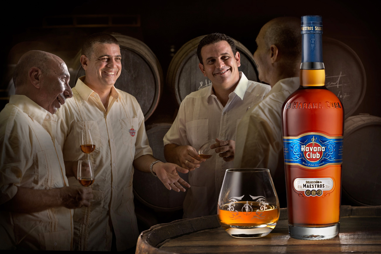 Selection de Maestros with master blenders sharing a drink in the distillery in Cuba