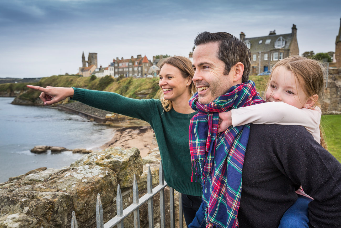 Historic Scotland  - at St Andrews Castle with a family pointing out to sea