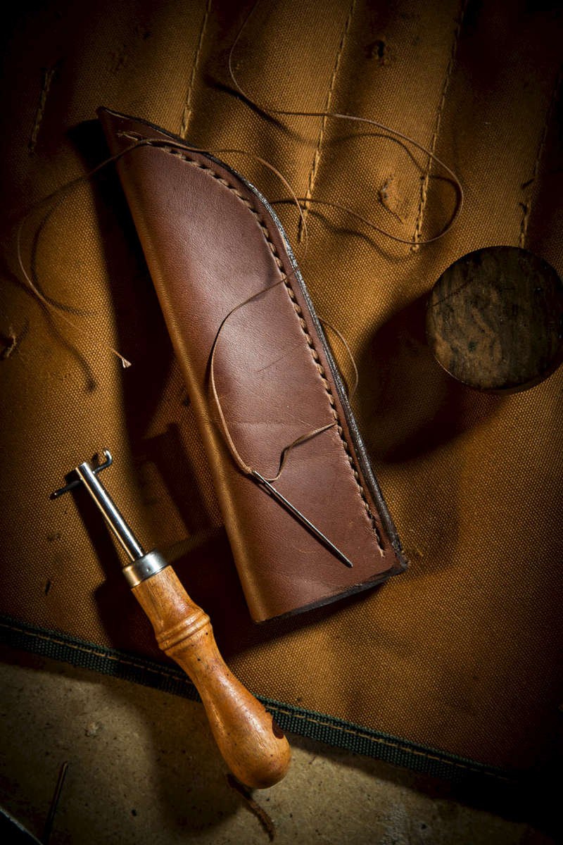 production of bespoke Damascus steel knive sheath from leather
