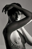 fine art black and white studio female nude Roarie Yum, with projected animal stripes