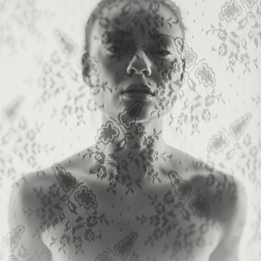 double exposure nude of a woman with fabric