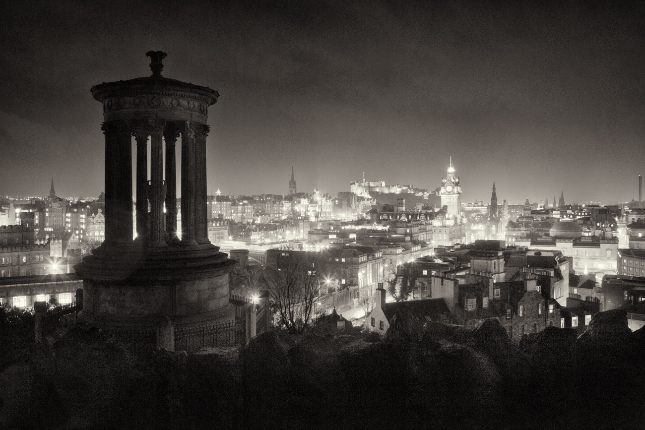 a view over Edinburgh from Calton Hill at night.