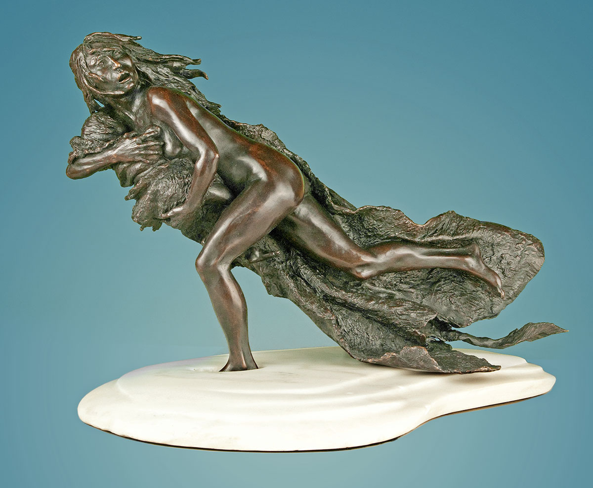Cheyenne woman running, the Washita Massacre.Bronze sculpture on white marble base by western artist Ernest Berke