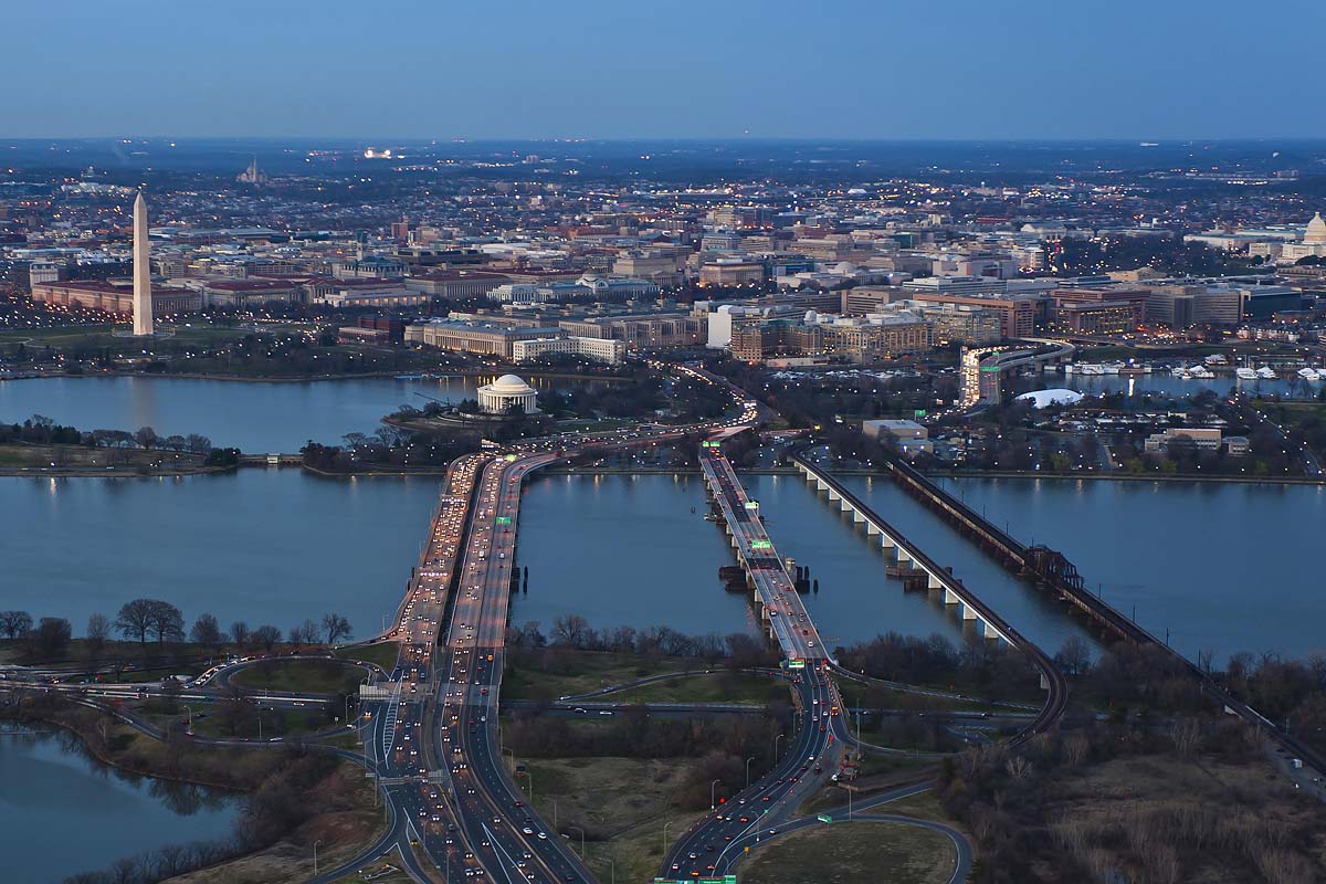 Twilight aerial image of Washington DC from the Lincoln Memorial to the Capitol.