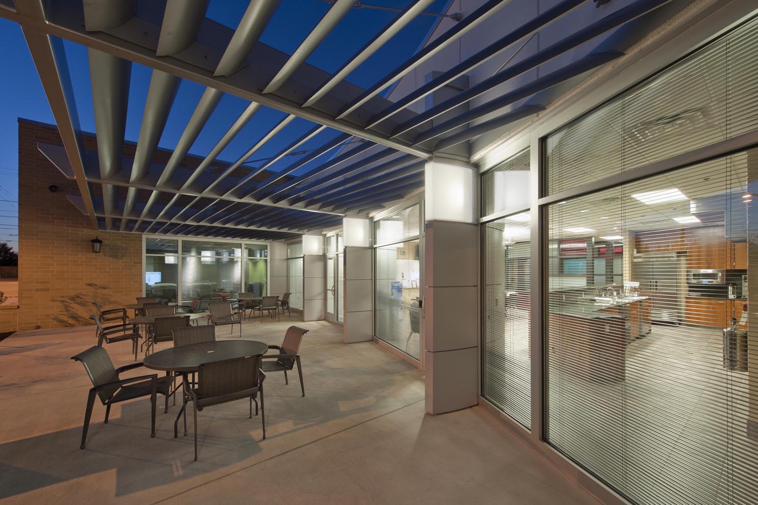 patio with metal trellis overhead