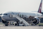 A Nordwind Airlines Boeing 777 plane from China is unloaded with 40 tons of medical supplies at the Ljubljana Airport on April 11, 2020.