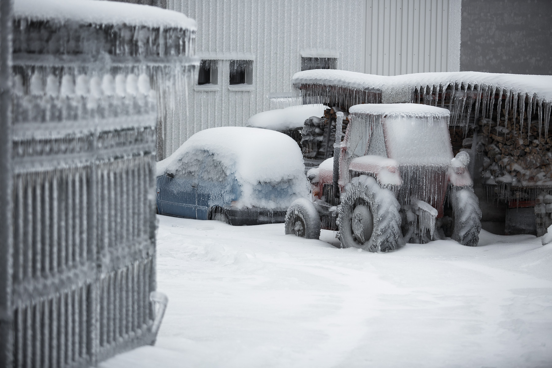 A tractor is covered in ice in Postojna, Slovenia, February 5 2014.