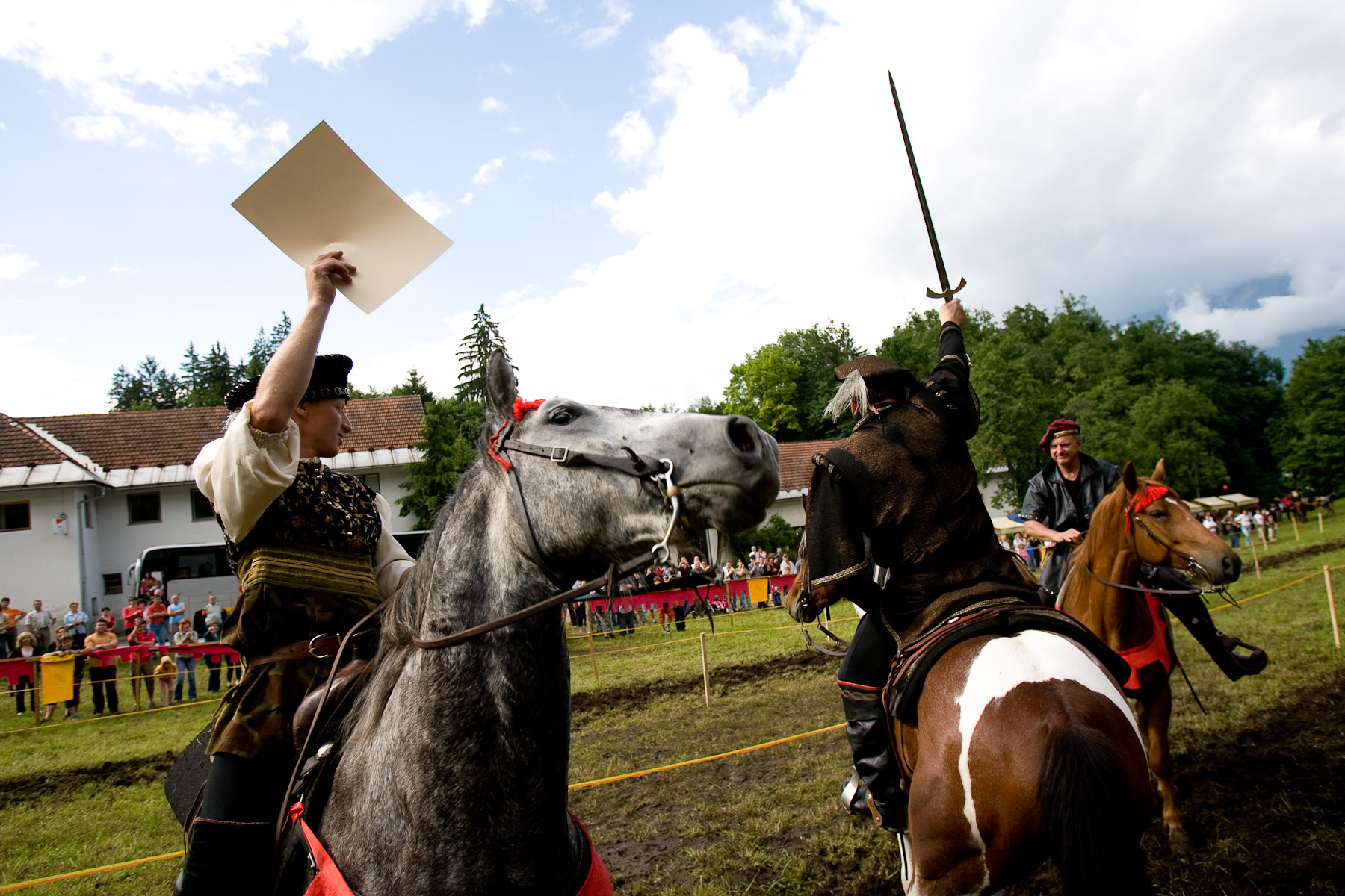A team of horsemen celebrates victory at a Medieval event in Bled, on June 8, 2008.