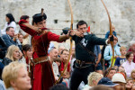 Archers perform at the castle of Celje, Slovenia, on August 30, 2008. Archery is an essential part of Medieval events. Target shooting is performed by skillful knights, while at the same time recreational target shooting is organized for visitors.