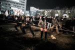 Protesters try to tear down the security fences in the Republic Square during the second countrywide uprising in Ljubljana, Slovenia, on January 11, 2013.