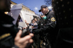 The police arrests protesters in Congress square during the fourth country-wide uprising against the political elites in Ljubljana, Slovenia, on March 9, 2013.