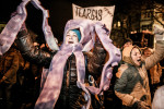 A protester wears an octopus mask referring to the system of local corruption during a protest against the mayor and the local government in Maribor, Slovenia, on December 14, 2012.